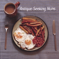ANTIQUE SEEKING NUNS: DOUBLE EGG WITH CHIPS AND BEANS (AND A TEA)