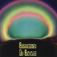 BUSINESSMEN ON BICYCLES: Businessmen On Bicycles