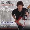 DAN SINDEL: Marching In