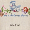 KATIE & PAT: On a Balance Beam