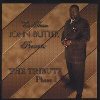 THE MINISTER John Butler : THE TRIBUTE Phase I