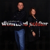 New Paved Road: Wounded Soldier