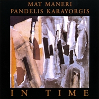 PANDELIS KARAYORGIS / MAT MANERI: In Time