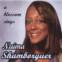 NAIMA SHAMBORGUER: A Blossom Sings