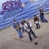 SLY JOE & THE SMOOTH OPERATORS: Surrounded By the Heart