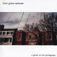 THIS GLASS EMBRACE: A Ghost in the Photograph