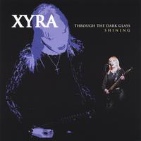 XYRA : Through the Dark Glass Shining